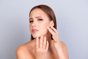 a woman concerned about her skin